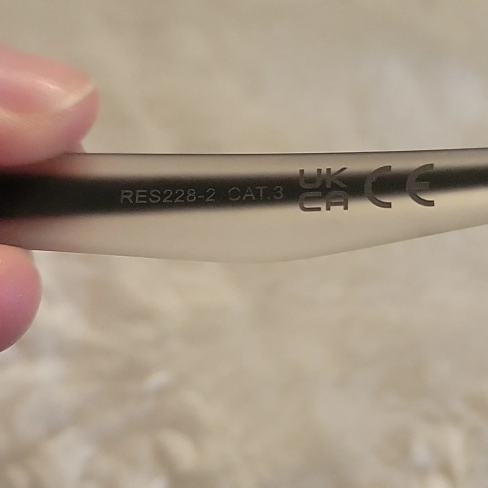 Reebok Gray, Black And White Sunglasses.